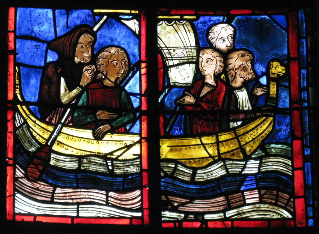 Stained glass window depicting five people in a boat
